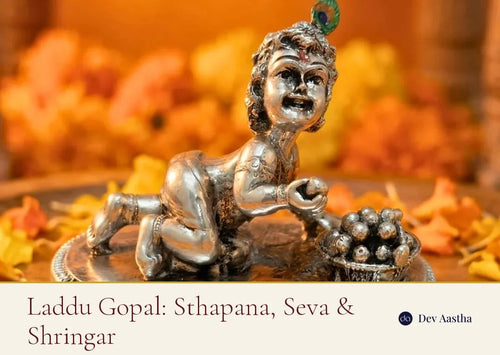 Laddu Gopal silver-plated idol on marigold petals, Dev Aastha