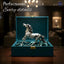 Silver horse statue in teal velvet gift box on wooden table, elegant home decor