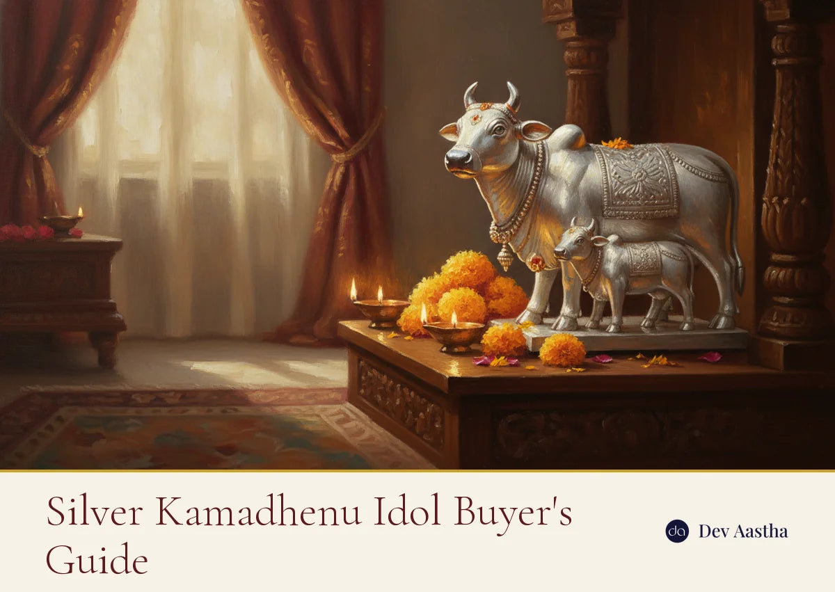 Silver-plated Kamadhenu cow with calf idol on a home mandir with glowing diyas and marigolds