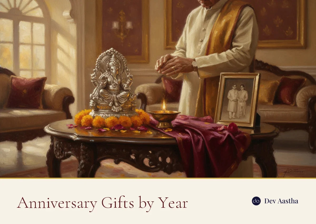 Anniversary Gifts by Year: a silver wedding anniversary celebration with a silver-plated Ganesha idol, diya and marigolds