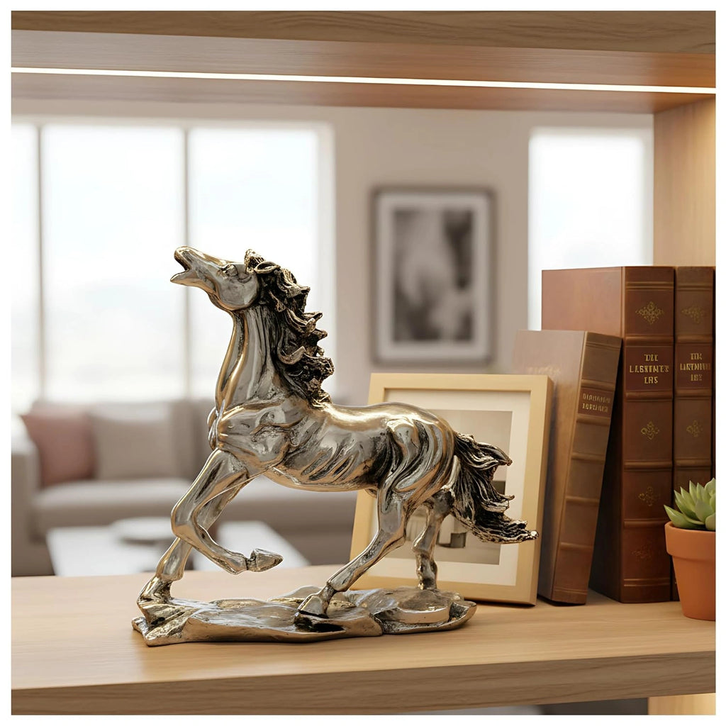 silver horse statue on wooden shelf with books, framed photo, and potted plant in living room