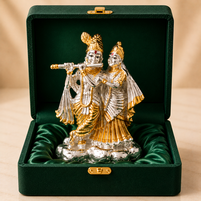 Radha Krishna silver-plated idol with gold accents in a green velvet gift box