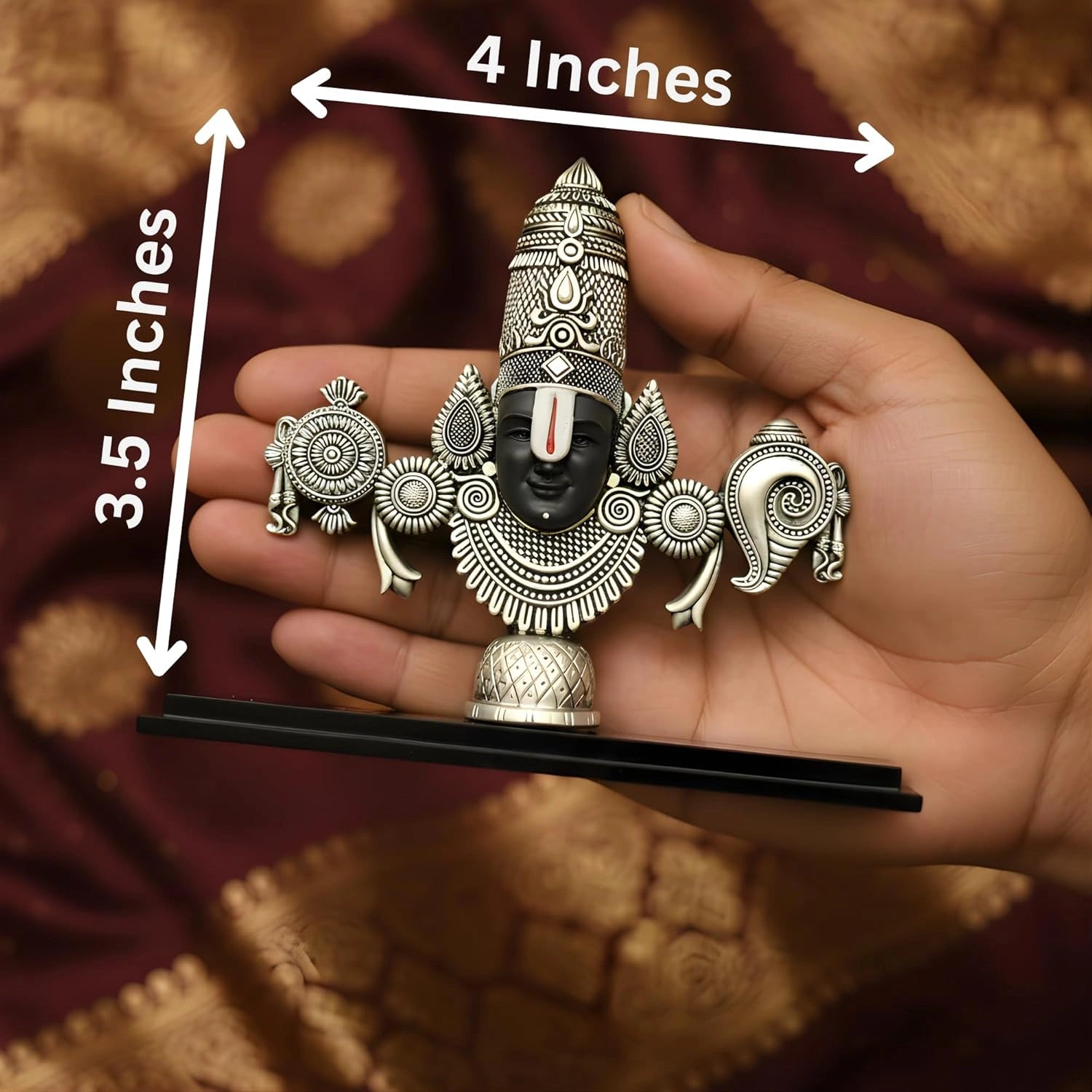 Lord Balaji silver-plated idol size chart held in palm: 4 inches wide, 3.5 inches tall