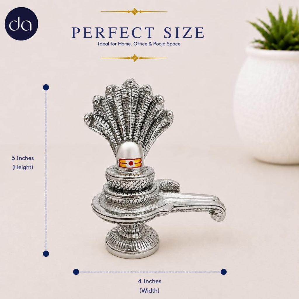Silver-plated Shivling encircled by the coiled Naga serpent
