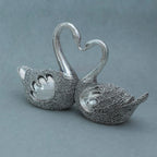 Silver lovebirds showpiece with textured bodies and necks forming a heart shape