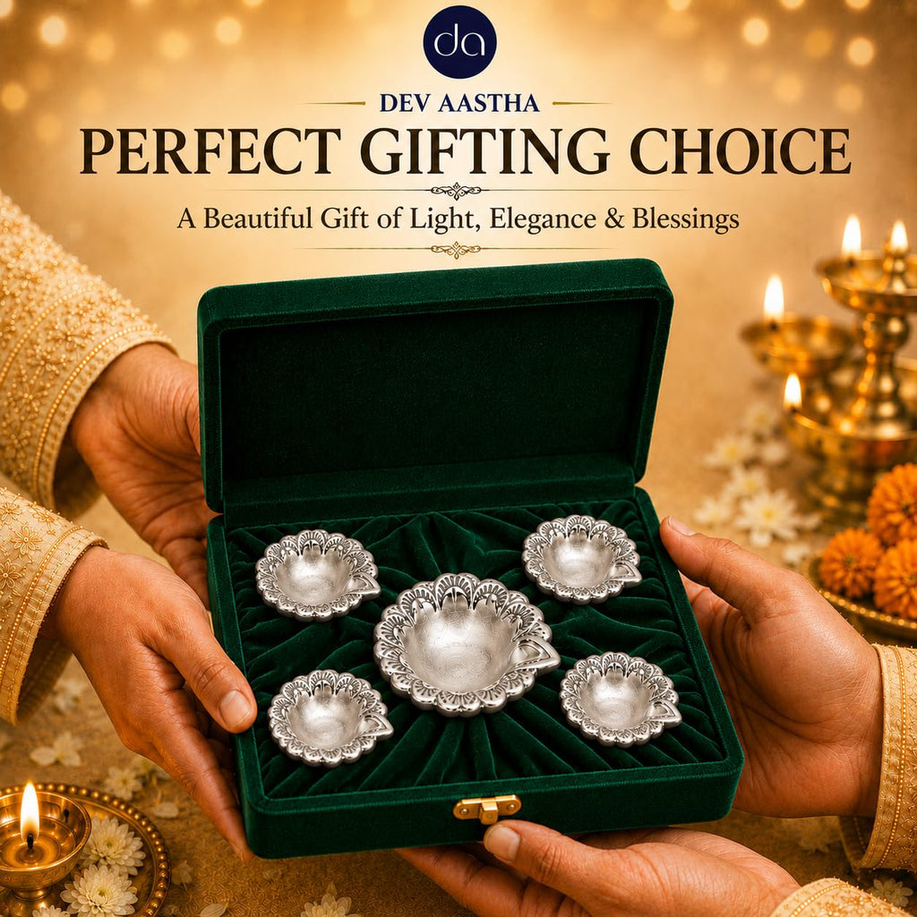 Set of silver-plated flower diyas arranged for Diwali