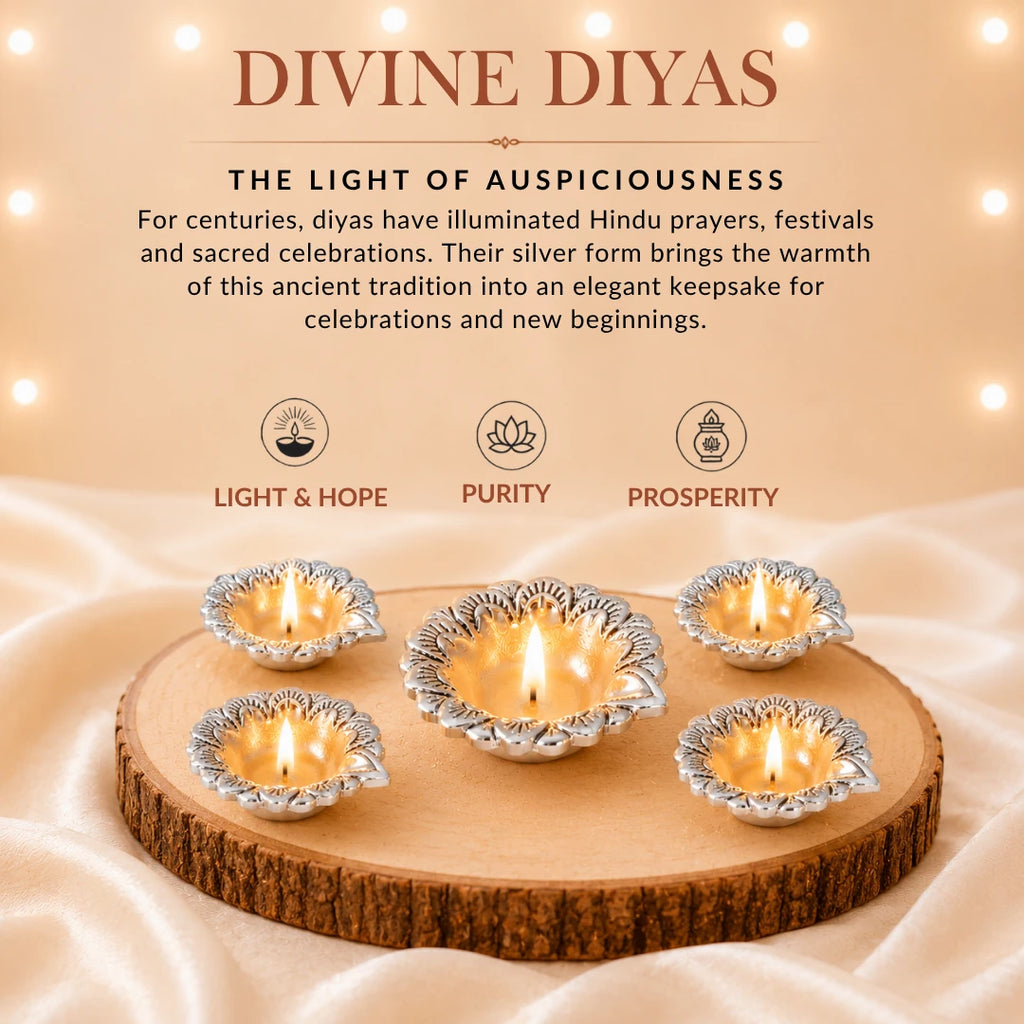 Five lit silver flower diyas on a wooden slice, marked as symbols of light and hope, purity and prosperity #set-of-5