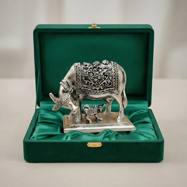 Kamdhenu cow and calf silver-plated idol in green velvet gift box with satin lining