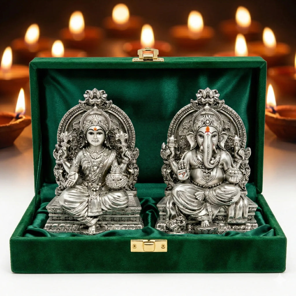 Lakshmi Ganesh silver-plated idol set in green velvet gift box surrounded by Diwali diyas