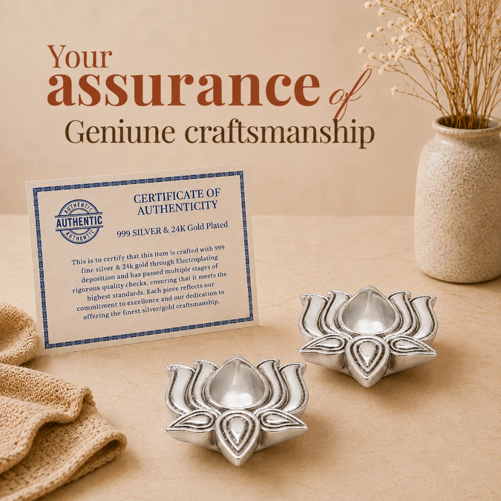 Certificate of authenticity for genuine craftsmanship placed beside two silver-plated lotus diyas #2