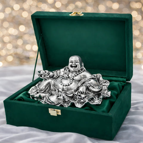 Laughing Buddha silver-plated idol reclining in green velvet gift box with festive lights
